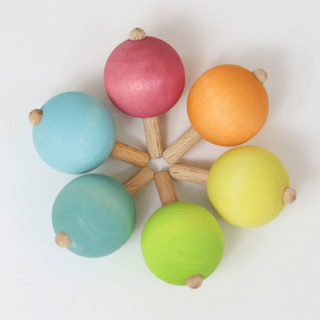 Grimm's Pastell Kreisel im Kreis gelegt